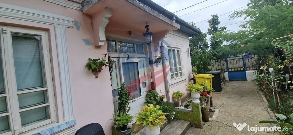 Casă parter cu teren generos de 595 mp, în Șimnicul de...