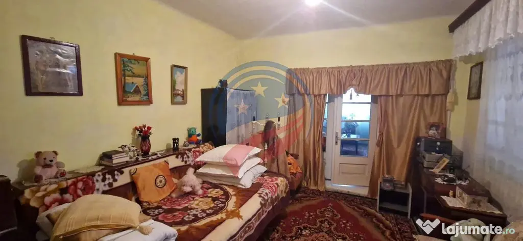 Casă parter cu teren generos de 595 mp, în Șimnicul de...