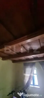 Casa cu doua corpuri