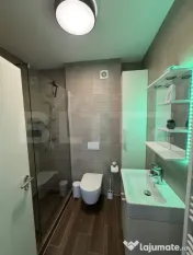 Apartament modern , 2.5 camere, etaj 2 , Tractorul , loc de