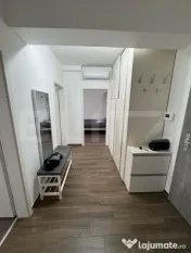 Apartament modern , 2.5 camere, etaj 2 , Tractorul , loc de
