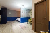Apartament cu trei unitati locative, baie si bucatarie fieca