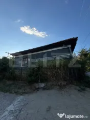 Casă de vânzare cu teren-ideală pentru o familie într-o 