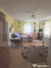 Casă cu 4 camere și teren de 1200 mp 