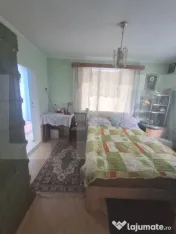Casă cu 4 camere și teren de 1200 mp 