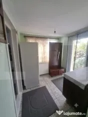 Casă cu 4 camere și teren de 1200 mp 