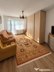 Apartament cu 2 camere, mobilat, balcon închis și spațiu 