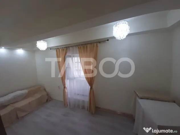Apartament de vanzare 3 camere pretabil spatiu comercial zon - Sibiu (Sibiu)