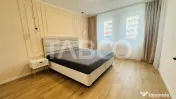 Apartament modern 63mpu 3 camere 2 bai 2 parcari de vanzare 