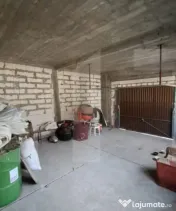 Casă P+M la roșu, teren 582 mp, garaj dublu, două intrăr