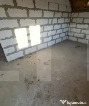 Casă P+M la roșu, teren 582 mp, garaj dublu, două intrăr