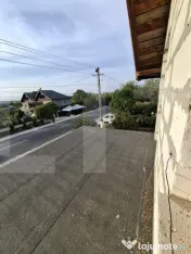 Casă P+M la roșu, teren 582 mp, garaj dublu, două intrăr