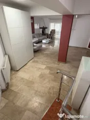 Casă versatilă cu o curte amenajată de 450 mp 