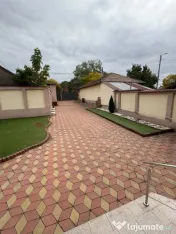 Casă versatilă cu o curte amenajată de 450 mp 