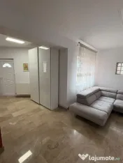 Casă versatilă cu o curte amenajată de 450 mp 
