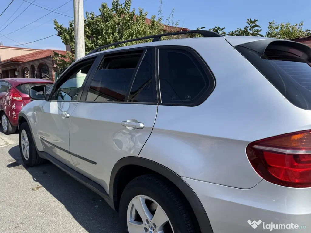 BMW X5 2010 — imagine 8