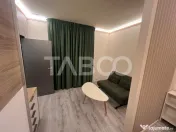 Garsoniera de inchiriat cu curte zona Centrala 2 parcari