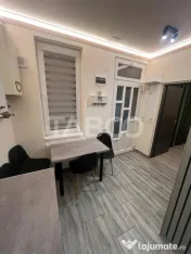 Garsoniera de inchiriat cu curte zona Centrala 2 parcari
