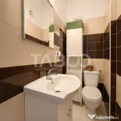 Apartament de vanzare 3 camere 2 bai balcon parcare intrare 