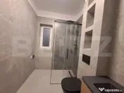 Casă individuală cu design nordic, terasă acoperită și 