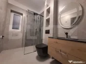 Casă individuală cu design nordic, terasă acoperită și 