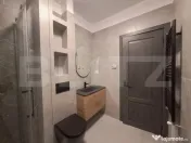 Casă individuală cu design nordic, terasă acoperită și 