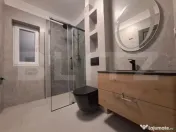 Casă individuală cu design nordic, terasă acoperită și 