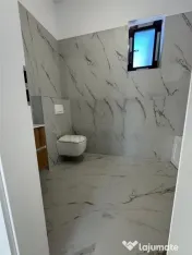 Jumatate de duplex pe parter, 3 dormitoare, curte uriasa de