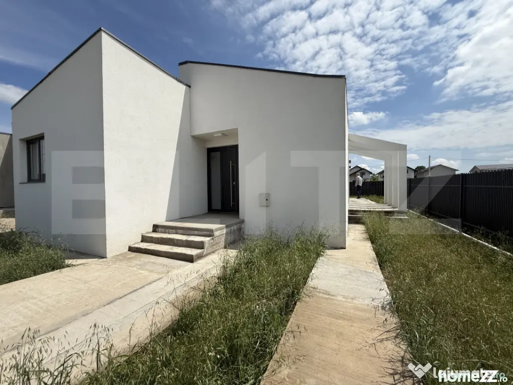 Casa pe parter cu un design deosebit, zona nordica / Simnicu