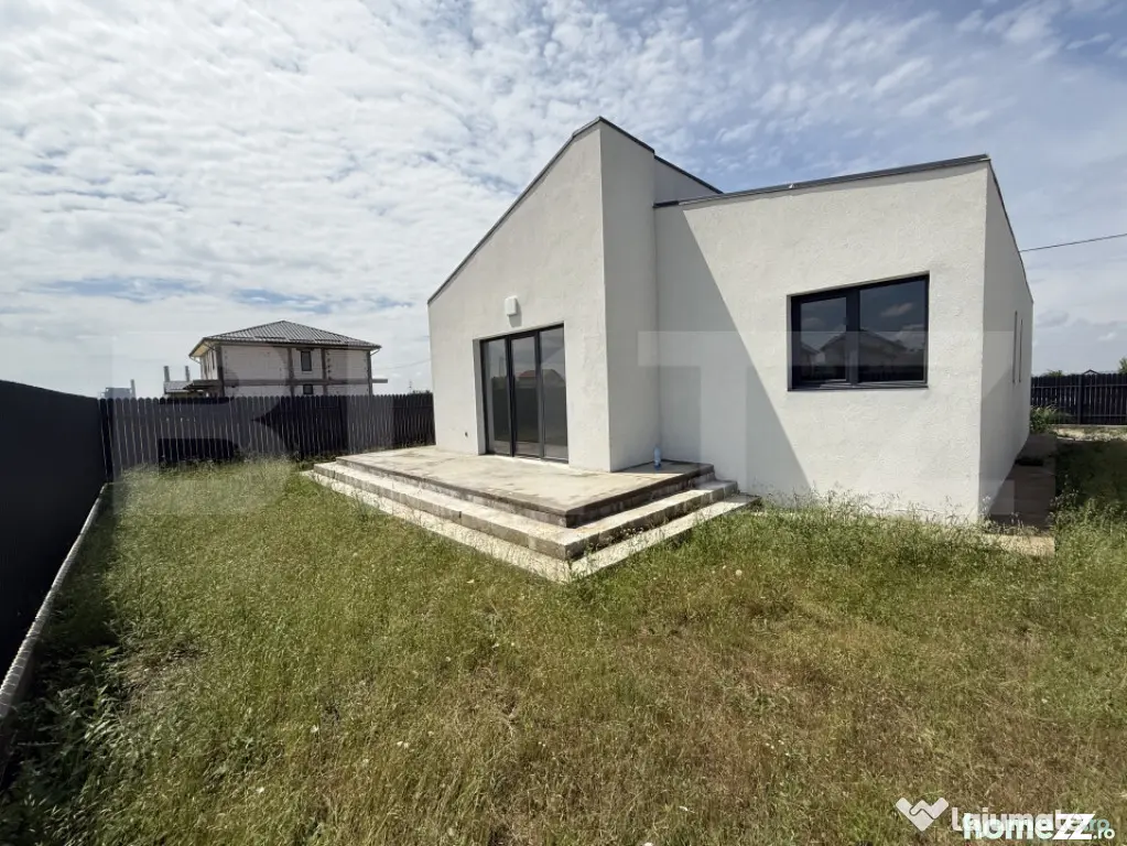 Casa pe parter cu un design deosebit, zona nordica / Simnicu