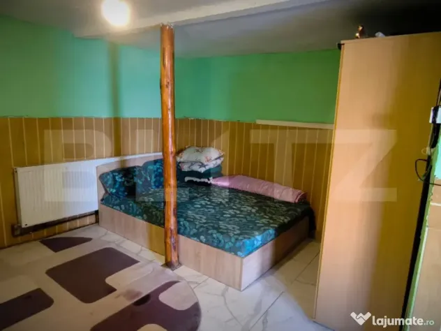 Casa parter 70 mp utili si 185 mp teren stradal, zona Ambasa