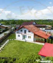 Casa cu teren generos si gradina spectaculoasa – Comuna Cu