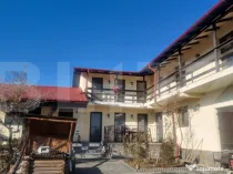 Proprietate deosebită cu teren generos, livadă pe rod și