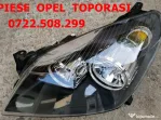 Far Opel Astra H stanga negru
