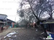 Casa taraneasca traditionala pe parter cu gradina si livada 