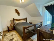 Refugiu pretios:jacuzzi, lemn masiv,2.000 mp teren,4 dormito 