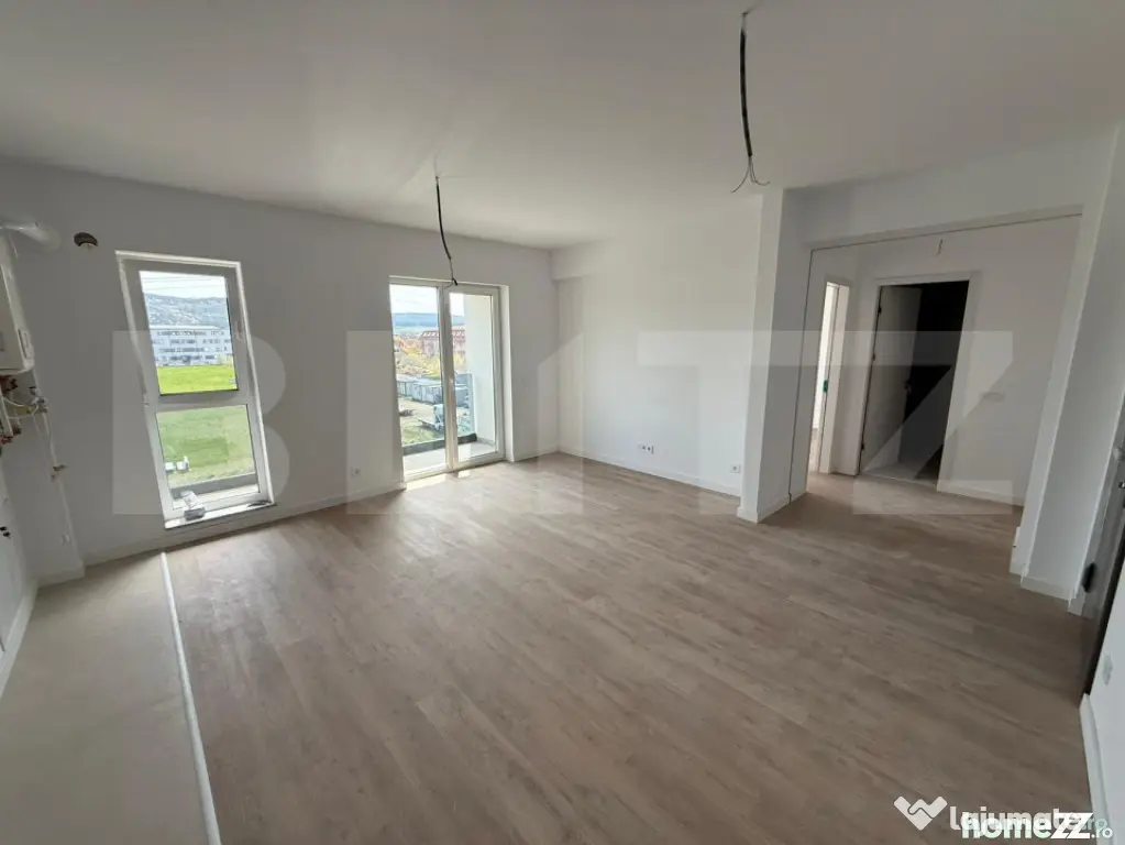 Apartament cu 2 camere, finisat, bloc nou, cu parcare subter