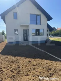 Casa P+M, exterior finisat, interior la gri, 500 mp teren, S