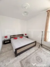 Cladire multifunctionala, pensiune plus casa, parcari priva 