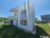 Casa individuala , 4 camere, 3 bai, garaj 26 mp , terasa 40 