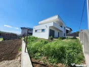 Casa individuala , 4 camere, 3 bai, garaj 26 mp , terasa 40 
