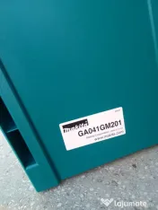 Polizor unghiular Makita cu 2 baterii și statie încărcare 