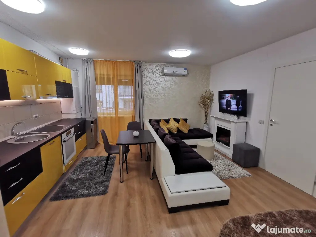 INCHIRIEZ Apartament 2cam bloc NOU,cu design modern,format din dormitor intim zonă de living open space(aprox 50mp)