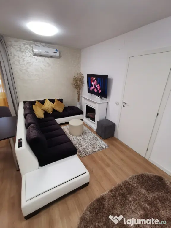 INCHIRIEZ Apartament 2cam bloc NOU,cu design modern,format din dormitor intim zonă de living open space(aprox 50mp)