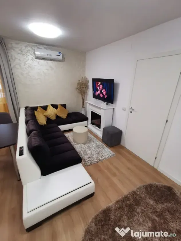 INCHIRIEZ Apartament 2cam bloc NOU,cu design modern,format din dormitor intim zonă de living open space(aprox 50mp)