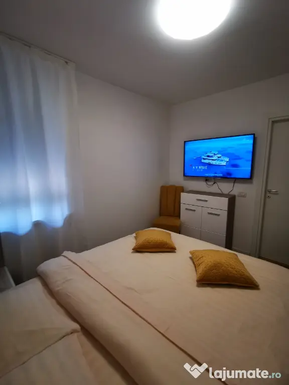 INCHIRIEZ Apartament 2cam bloc NOU,cu design modern,format din dormitor intim zonă de living open space(aprox 50mp)