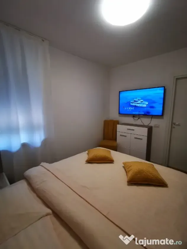 INCHIRIEZ Apartament 2cam bloc NOU,cu design modern,format din dormitor intim zonă de living open space(aprox 50mp)