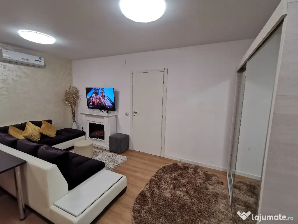 INCHIRIEZ Apartament 2cam bloc NOU,cu design modern,format din dormitor intim zonă de living open space(aprox 50mp)