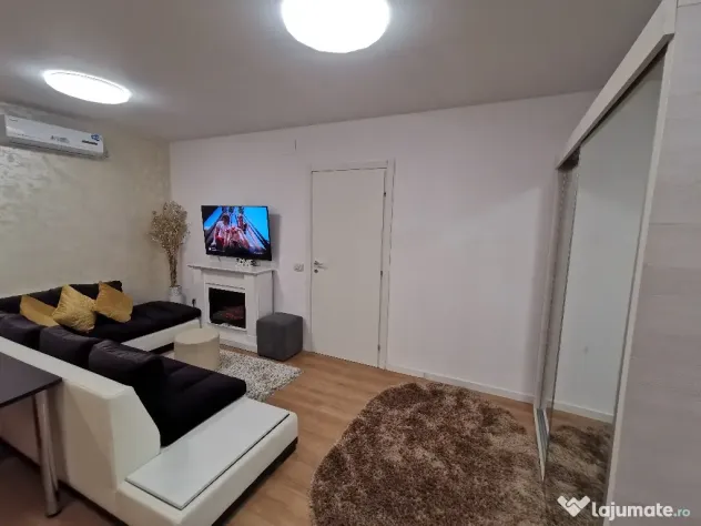INCHIRIEZ Apartament 2cam bloc NOU,cu design modern,format din dormitor intim zonă de living open space(aprox 50mp)