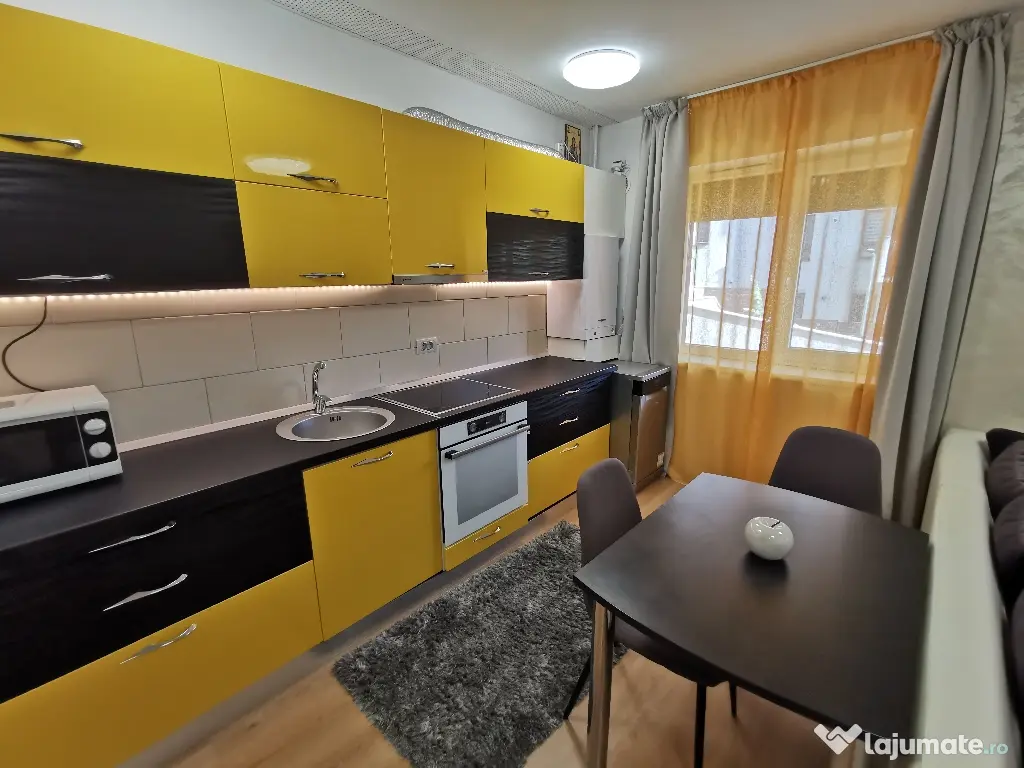 INCHIRIEZ Apartament 2cam bloc NOU,cu design modern,format din dormitor intim zonă de living open space(aprox 50mp)